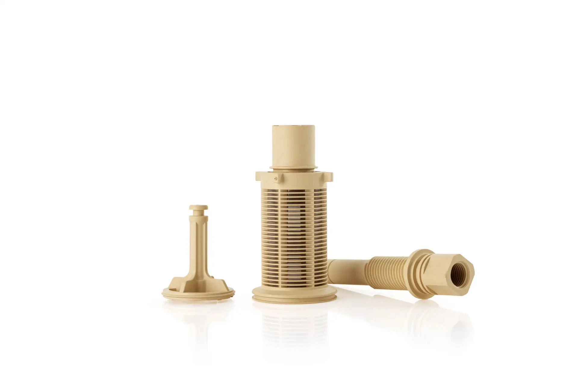 Beige plastic filter set with perforated cylinder and connectors